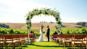 Charming setup for Clarksburg Wedding Venues featuring a floral arch and vineyard background.